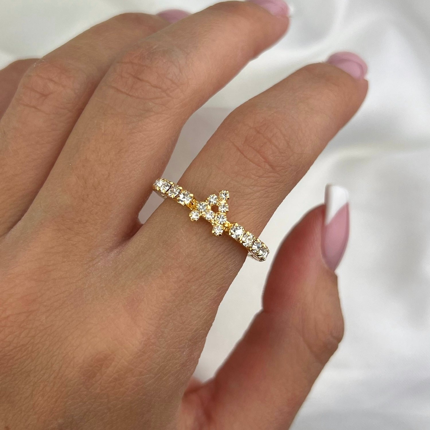 Anillo con letra de tenis