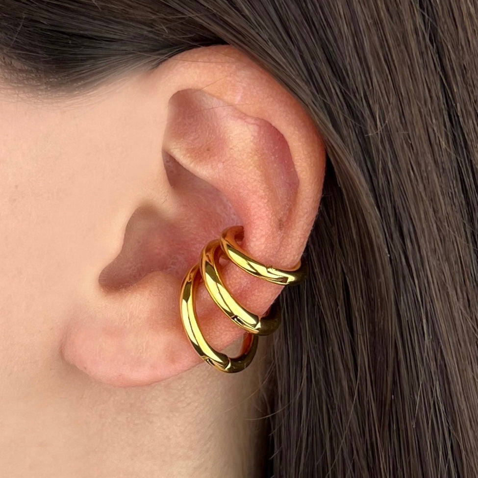 Se necesita un juego de aretes tipo manguito para la oreja