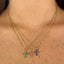 Collar de cruz de colores
