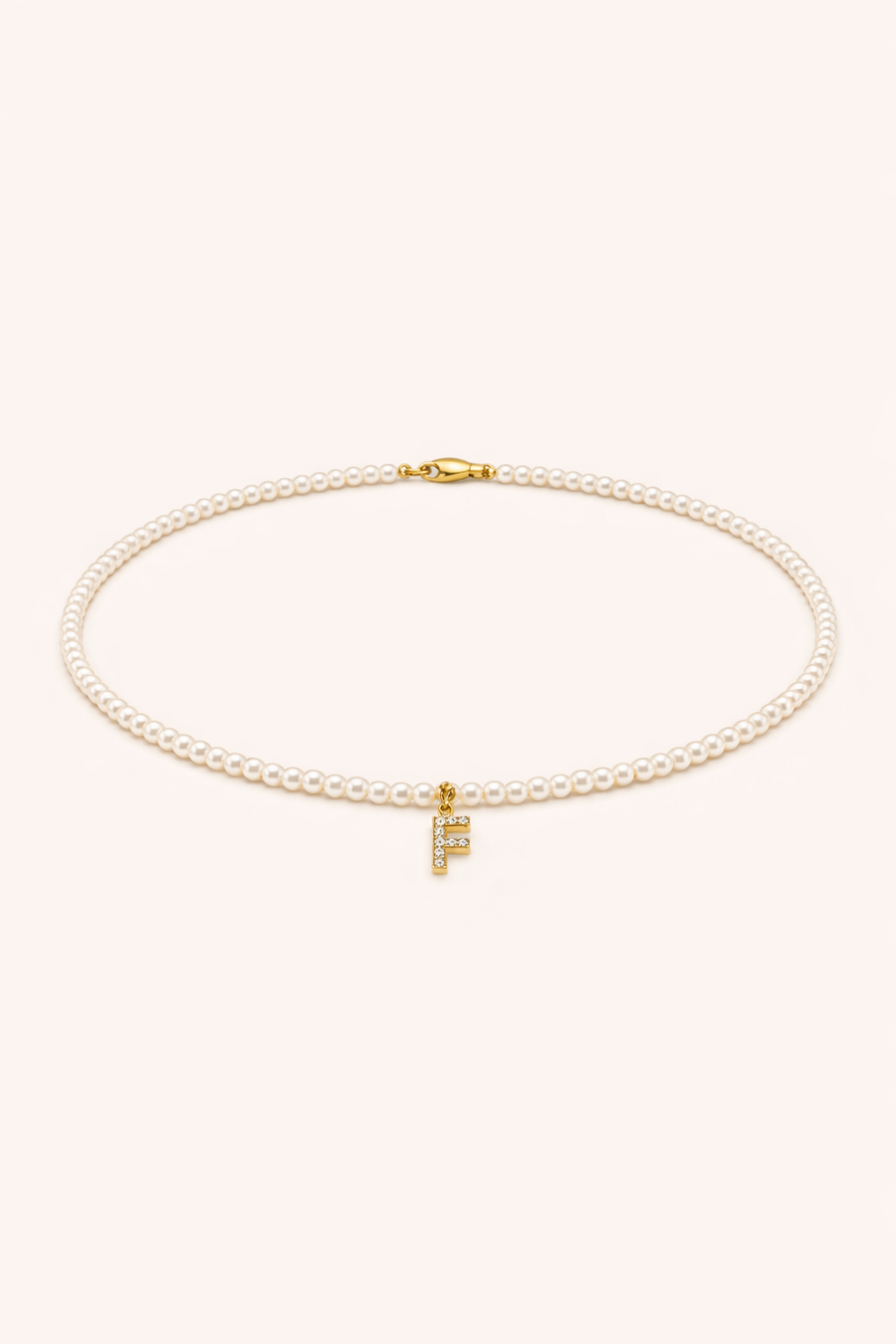 Collana Micropearl Initial — Packshot collana di perline con ciondolo lettera F